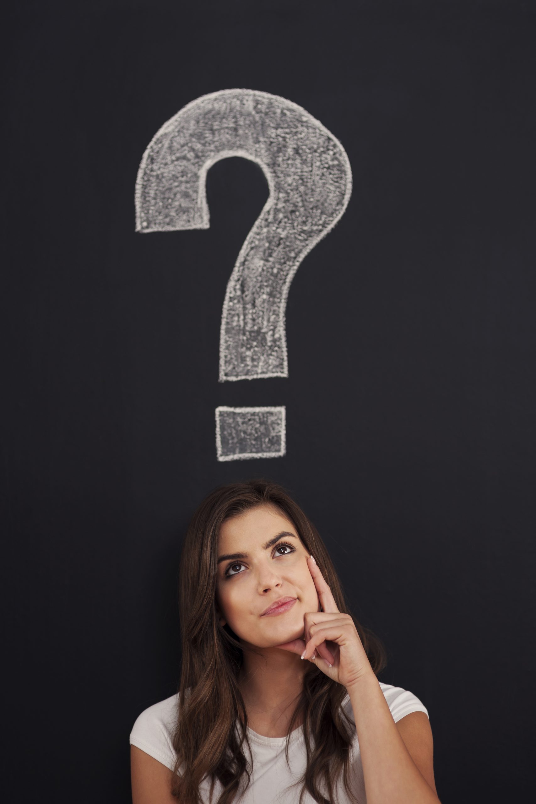 Big question mark on blackboard